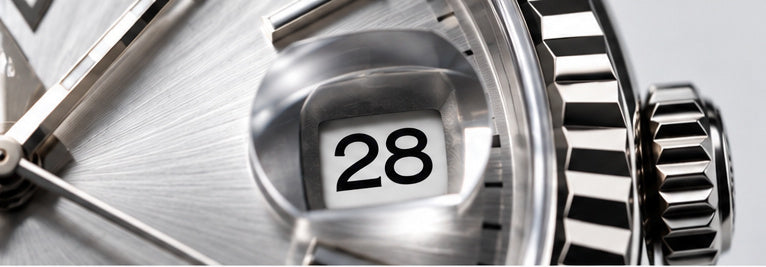 Cyclops lens above the date window
